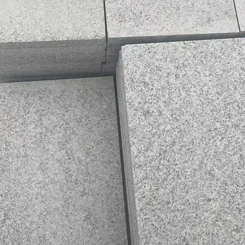 新疆芝麻白地铺石石材厂家